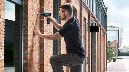 Дрель-шуруповерт аккумуляторная, ударная Bosch GSB 120-LI (2x 2.0 Ah) + набор оснастки (23 пр.)