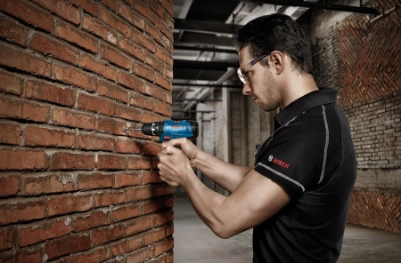 Дрель-шуруповерт аккумуляторная, ударная Bosch GSB 120-LI (2x 2.0 Ah) + набор оснастки (23 пр.)